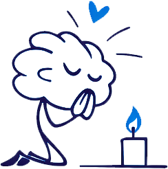 Mascot kneeling in prayer